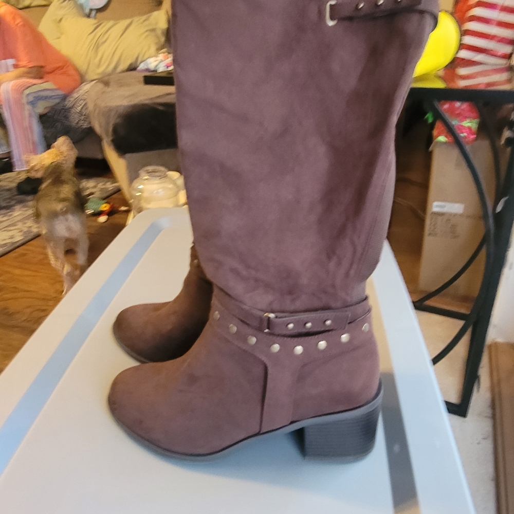 Torrid dark brown knee high Western boot. Gold studding on the strap. Size 11